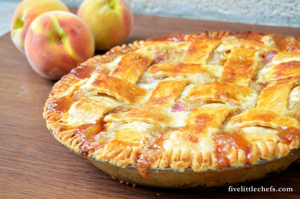 This easy peach pie can be in the oven within 15 minutes. Use fresh peaches and a premade pie crust. Your guests will ask for the recipe!