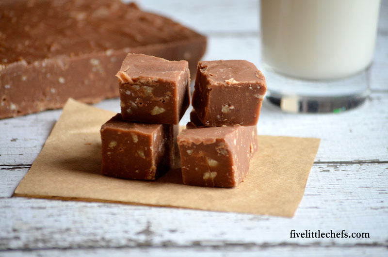Easy Peanut Butter Fudge is a perfect for a party or packaged cute for neighbor gifts. This fudge is soft and creamy you won't believe how easy it is to make.