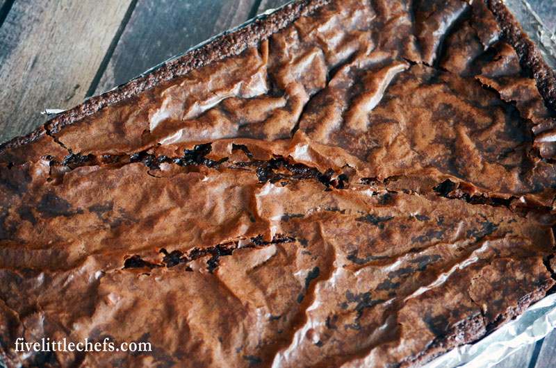Why do brownies crack after they cool? The answer is surprisingly simple. Next time you make a batch of brownies use this simple tip to eliminate bubbles and cracks.