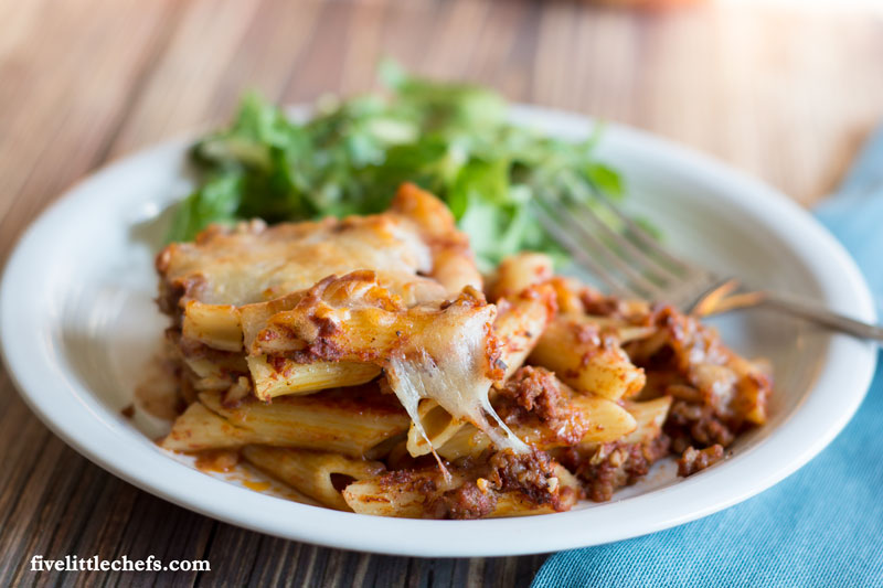 Baked Cheesy Sausage Penne is ultimate comfort foods. Use penne pasta, italian sausage and lots of mozzerella cheese to make it as cheesy as you want. Dinner is easy on the table within an hour, making for a great weeknight meal.