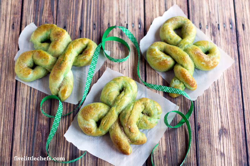 Homemade St. Patrick's Day Cinnamon Sugar Soft Pretzels are a great way to celebrate the holiday. Easy recipe with step by step instructions! Let the kids help or surprise them with this after school snack!